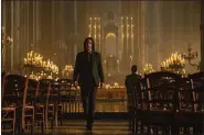  ?? MURRAY CLOSE — LIONSGATE VIA AP ?? This image released by Lionsgate shows Keanu Reeves as John Wick in a scene from “John Wick 4.”