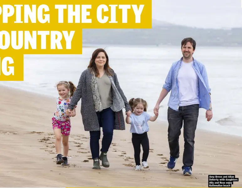  ??  ?? Amy Breen and Allan Doherty with daughters Ally and Rose enjoy Rathmullan beach