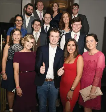  ??  ?? Martin O’Regan from Banteer Macra, the All-Ireland -23 stock judging winner congratula­ted by club members at the Macra National Conference in Cork. Photos: John Tarrant.