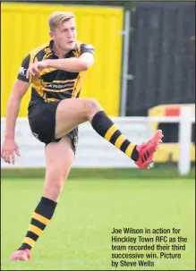  ??  ?? Joe Wilson in action for Hinckley Town RFC as the team recorded their third successive win. Picture by Steve Wells