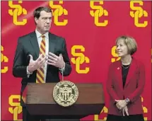  ?? Brian van der Brug Los Angeles Times ?? USC PRESIDENT Carol L. Folt, right, was happy with the first major decision made by athletic director Mike Bohn. D6.