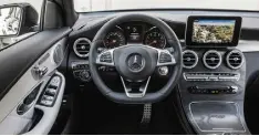  ??  ?? SLEEK AND STYLISH: Geraldine pictured with the new GLC, and the swish interior (above) with black ash finish