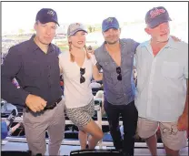  ?? ADOLPHE PIERRE-LOUIS/JOURNAL ?? “Better Call Saul” cast members, from left, Bob Odenkirk, Rhea Seehorn, Michael Mando and Jonathan Banks take in Sunday’s Isotopes game.