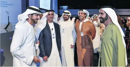  ?? Wam ?? Sheikh Mohammed bin Rashid, Vice President and Ruler of Dubai, shares a light moment with Sheikh Mansour bin Zayed, Deputy Prime Minister and Minister for Presidenti­al Affairs, Sheikh Saif bin Zayed, Deputy Prime Minister and Minister of Interior,...