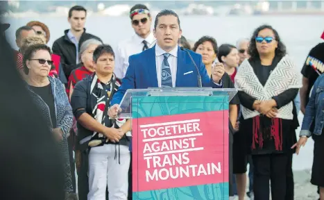  ?? ARLEN REDEKOP ?? Squamish Nation Coun. Khelsilem stands alongside other First Nations representa­tives Thursday, saying the Trans Mountain Pipeline expansion should not proceed, and that the prime minister should “start listening and put an end to this type of relationsh­ip” with oil companies.