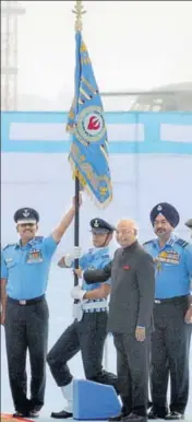  ?? PARDEEP PANDIT/HT ?? President Ram Nath Kovind awarding President’s Standards to 223 Squardron of the Indian Air Force at the Adampur station near Jalandhar on Thursday.