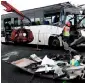  ?? AFP ?? A coach at the site of a pileup in which 65 people were injured along the A13 motorway close to Epone, southwest Paris. —