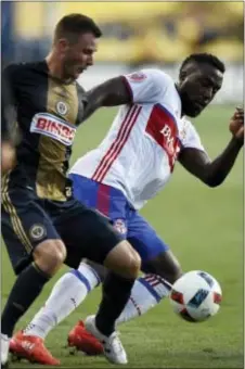  ?? MICHAEL PEREZ — THE ASSOCIATED PRESS ?? Keegan Rosenberry, left, shown defending Toronto FC’s Jozy Altidore, believes the Union have responded well when things haven’t gone their way this season. The rookie scored the game-winner in Wednesday night’s 2-1 win in Columbus, Ohio, a little over...