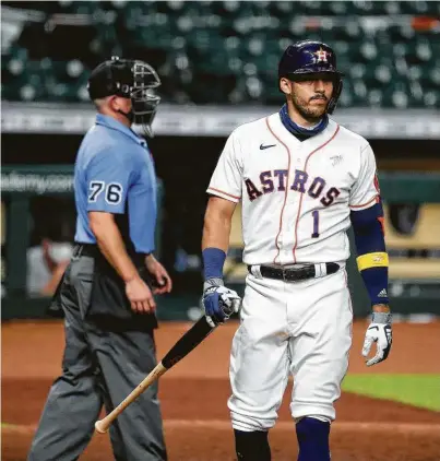  ?? Karen Warren / Staff photograph­er ?? Astros shortstop Carlos Correa reacts after he struck out during the ninth inning on Friday against the Diamondbac­ks. The Astros have the easiest schedule in baseball in this stretch, but their offensive woes continue.