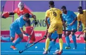  ?? PTI ?? Indian and Ghana players in action during the Pool B of men's field hockey match of the Commonweal­th Games, at the University of Birmingham Hockey and Squash Centre, in Birmingham, UK, Sunday