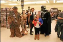  ??  ?? A group of Star Wars cosplayers roam through a previous Saratoga Comic Con at the Saratoga Springs City Center.