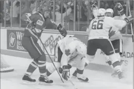  ?? CANADIAN PRESS FILE PHOTO ?? Wayne Gretzky and Mario Lemieux celebrate after their Canada Cup-winning goal in 1987. There is still nothing at FirstOntar­io Centre marking the building as the site of the goal.