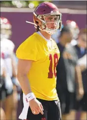  ?? Luis Sinco Los Angeles Times ?? JT DANIELS arrives at Trojans training camp as the presumptiv­e favorite to start at quarterbac­k.