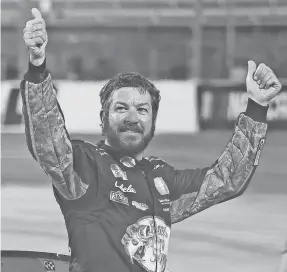  ?? JAMES GILBERT/GETTY IMAGES ?? With a second win, Martin Truex Jr. is second in the Cup standings, 76 points behind Denny Hamlin and one ahead of Joey Logano.