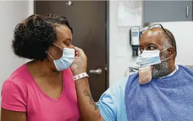  ?? UTHealth ?? Anthony Jones and his wife, Gail Jones, prepare for a surgery to reduce the size of his severely swollen tongue.