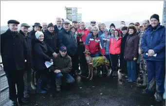  ??  ?? The Carroll family and Olga O’Sullivan after Olga’s dog, Careful Sylvie, won the Johnny Carroll Cup at Ballybegga­n coursing last Wednesday.