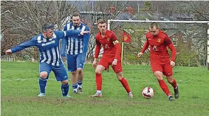  ?? ?? ●●Action from AFC Stockport’s clash against Hillgate (AFC in red)