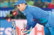  ?? AFP ?? ▪ MS Dhoni has had a good run behind the stumps at home.