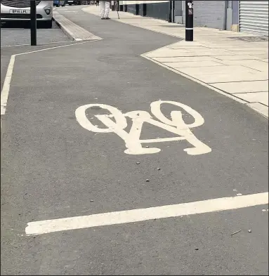  ??  ?? ■
Pop-up cycle lanes are just one measure designed to boost cycling in the area.