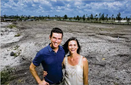  ?? RICHARD GRAULICH PHOTOS / THE PALM BEACH POST ?? Once completed, Arden’s farm will have a 4,000-square-foot barn and 5 acres of soil being tended by the neighborho­od’s recently hired farm directors, Tripp Eldridge and Carmen Franz.