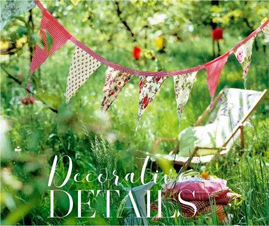  ??  ?? BUNTING signals a summer celebratio­n outdoors like nothing else. Hang from trees above a table or beside a seating area where it will catch the breeze and make an occasion feel special. Ribbons or lanterns will have a similar effect