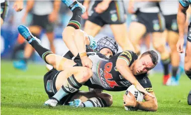  ?? Photo / Getty Images ?? Panthers five-eighth James Maloney struggled to impose himself for much of last night’s playoff against the Sharks.