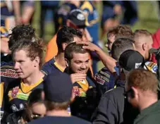  ??  ?? Highfields Eagles player Nick Bainbridge celebrates his side’s 28-14 eliminatio­n final win over Warwick.