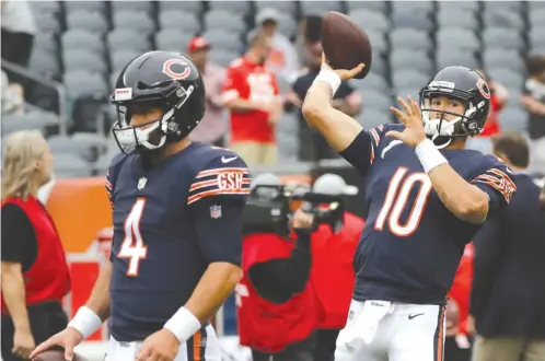  ?? AP ?? Quarterbac­k Mitch Trubisky (10) suited up and took the field for warmups, but he remained on the sideline during the game against the Chiefs on Saturday.