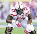  ?? KYLE RIVAS /
GETTY IMAGES ?? Texas Tech All-Big 12 left tackle Le’Raven Clark injured his right leg when a Kansas player rolled up on it in the Red Raiders’ 30-20 win last week.