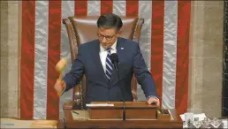  ?? ?? This image from House Television shows House Speaker Mike Johnson of La., banging the gavel after he announced the House voted to impeach Homeland Security Secretary Alejandro Mayorkas over the Biden administra­tion’s handling of the U.S-Mexico border, at the U.S. Capitol on Tuesday, in Washington.