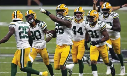  ??  ?? The Packers celebrate a crucial fumble recovery. Photograph: Brett Duke/AP