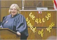  ?? STAFF PHOTO BY OLIVIA ROSS ?? Hamilton County Criminal Court Judge Amanda Dunn speaks Monday during Amy Piercy's graduation from the Hamilton County Drug Recovery Court program.