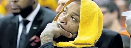  ?? JASON MILLER/GETTY IMAGES ?? Then-Toronto Raptor P.J. Tucker watches from the bench during the final minutes of game 2 of the Raptors’ Eastern Conference semifinal against the Cleveland Cavaliers on May 3.