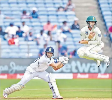  ?? PRATHAM GOKHALE/HT PHOTO ?? ■ Mayank Agarwal (L) hit 16 fours and two sixes en route to scoring 108 off 195 balls against South Africa on the first day of the second Test on Thursday.