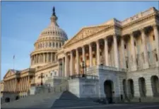  ?? J. SCOTT APPLEWHITE — THE ASSOCIATED PRESS FILE ?? In this file photo, the Senate side of the Capitol is seen in Washington. If Republican­s can’t pass a budget, forget about a major overhaul of the nation’s tax code — at least if they want a GOP-only approach with President Donald Trump that would...