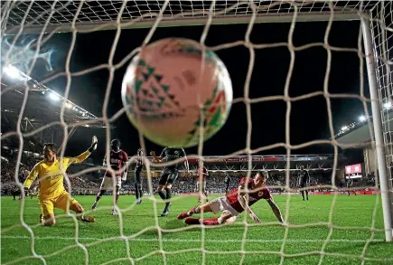  ?? GETTY IMAGES ?? Aden Flint of Bristol City scores their second goal during the semifinal second-leg match.