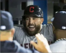  ?? FRED THORNHILL — CANADIAN PRESS ?? Jason Kipnis is congratula­ted by teammates after his three-run home run against the Blue Jays during the ninth inning Sept. 6 in Toronto.