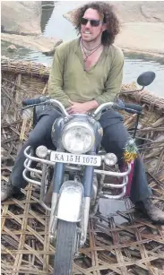  ??  ?? Nomadic: Robert Jamison travelled around India on a motorbike