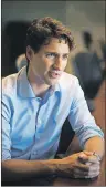  ?? /"5)"/ 30$)'03% 5)& (6"3%*"/ ?? Prime Minister Justin Trudeau sits down for a one-on-one interview with Guardian reporter Teresa Wright at the Charlottet­own Airport on Thursday.