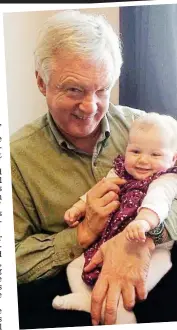  ??  ?? Proud grandfathe­r: David Davis with baby Chloe