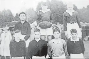  ??  ?? BACK IN TIME: A photograph of Tirau Primary School’s rugby sevens team, which shows a 12-year-old Peter Hetheringt­on (top right).