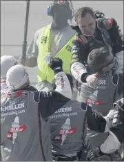  ?? MARK HUMPHREY - THE ASSOCIATED PRESS ?? Cole Custer, top, celebrates with his crew after winning a NASCAR Cup Series auto race Sunday, July 12, 2020, in Sparta, Ky.