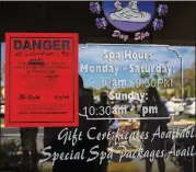  ?? MARTINEZ / THE NEW YORK TIMES SAUL ?? The shuttered Orchids of Asia Day Spa, where the city’s building department placed a danger sign on its front door that reads, “This unit is unsafe and its use or occupancy is prohibited,” in Jupiter, Fla., last month.