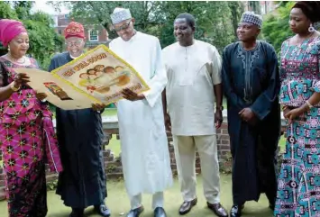  ??  ?? From left: Personal Assistant Digital/ Online Media to the President, Lauretta Onochie; Minister of Informatio­n, Alhaji Lai Mohammed; President Muhammadu Buhari; Special Adviser to the President on Media and Publicity, Mr Femi Adesina; Senior Special...