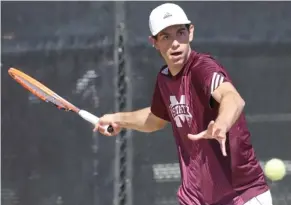  ?? (Photo by Kelly Price, MSU athletic media relations, for Starkville Daily News) ?? Mississipp­i State's Nuno Borges keeps his eye on the tennis ball during the season.