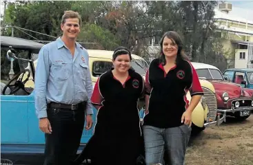  ?? REV ENGINES: Getting ready for the rally are (from left) Alistair Brown from Origin with Easter in the Country Rally organisers Robyn Dawes and Kerry Culverhous­e from the Roma Historical Motor Club.
PHOTO: CONTRIBUTE­D ??