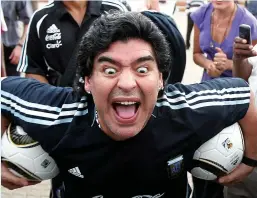  ?? Pictures: GETTY; REUTERS ?? Colourful... Maradona entertains schoolchil­dren in South Africa in 2010