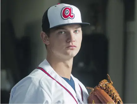  ?? TED RHODES/ FILES ?? Calgary’s Mike Soroka, 19, enjoyed a banner year pitching in the Atlanta Braves minor league system. After pitching in the South Atlantic League’s all-star game and helping his club win the championsh­ip, he’s home for a short break before beginning...