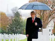  ?? [AP PHOTO] ?? President Donald Trump stands among the headstones Sunday during an American Commemorat­ion Ceremony at Suresnes American Cemetery near Paris.