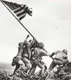  ?? Joe Rosenthal / Associated Press 1945 ?? Marines hoist the American flag on Iwo Jima in 1945.